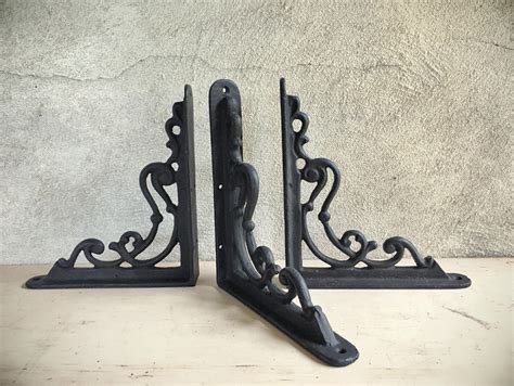 old-fashioned metal shelf brackets|old wooden shelf brackets.